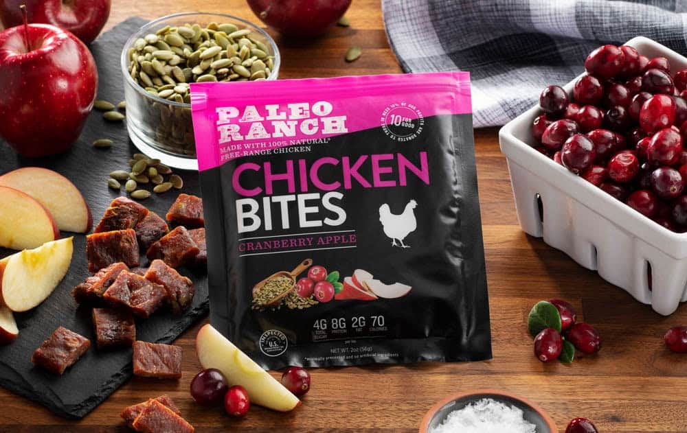 Paleo Ranch Chicken Bites – Cranberry Apple – Food Photography Paleo Ranch Chicken Bites with cranberry and apple, surrounded by fresh ingredients.