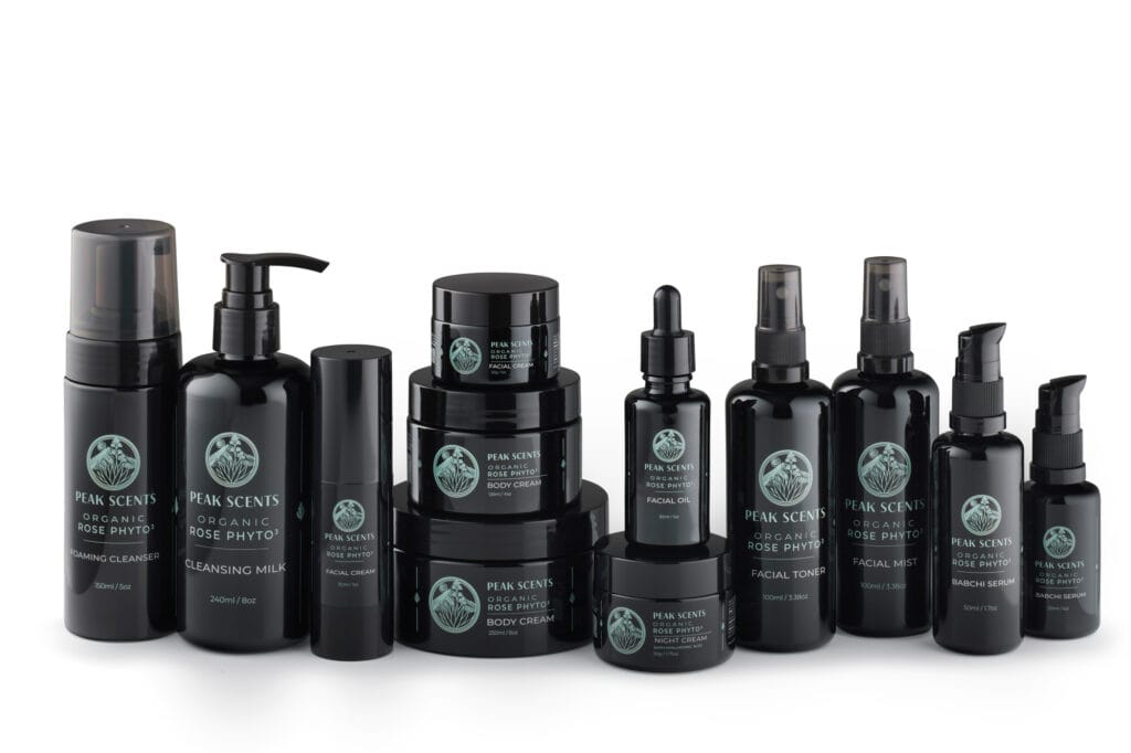 Organic Skincare – Product Photography Collection of black organic skincare bottles, jars, pumps, sprays, and facial serums on white